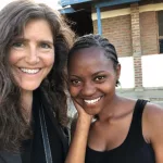 Liz Fanning and a volunteer from Malawi